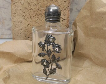 Vintage Clear Glass Decorative Perfume Bottle Embellished with Silver Flower Design and Gems