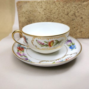 Handbemalte Nippon Japan Tasse und Untertasse in buntem Blumenmotiv