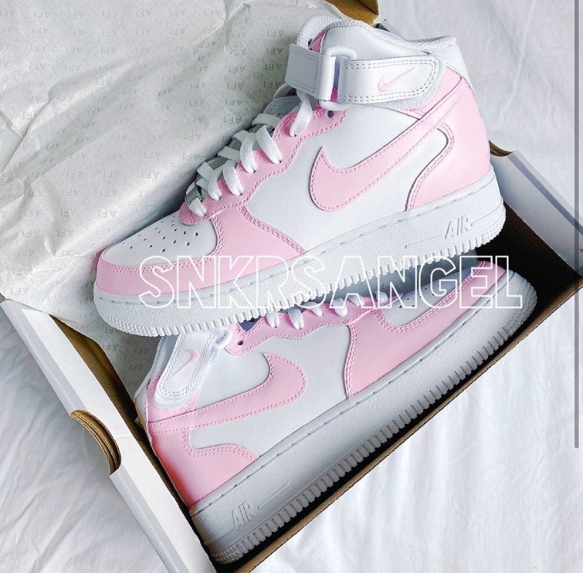 nike pink and black high tops