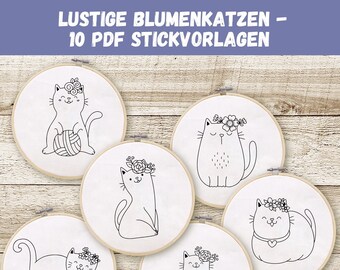 May include: Ten embroidery hoop patterns featuring cute cats with flower crowns. The patterns are black and white line drawings on a white background.
