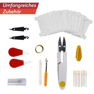 May include: A set of sewing tools and supplies, including thread bobbins, a pair of small scissors, a needle threader, a thimble, a needle case, and a set of needles.