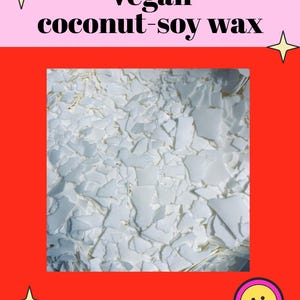 The image is a square with a red border, containing a close-up view of a white, crinkled material, which appears to be a vegan coconut-soy wax.