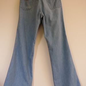 Levi's Vintage Bell Bottom Jeans 1970s Flared Denim Pants High Waist Jeans  White Tab Made in France NOS Size US 27/28 