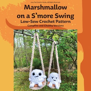 May include: A crochet pattern for a marshmallow on a s'more swing. The pattern includes instructions for both campfire and chubby versions. The image shows two white crocheted marshmallows on a swing made of beige yarn.