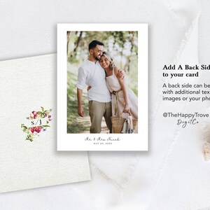 May include: A white card with a floral design and the initials "S/J" in a white rectangle. The card has a photo of a couple embracing in a wooded area. The text "Mr & Mrs Nach" and "MAY 30, 2035" is printed below the photo. The text "Add A Back Side to your card" is printed on the right side of the card. The text "A back side can be added with additional text, images or your photos" is printed below the first line of text. The text "@TheHappyTrove Digitl" is printed below the second line of text.