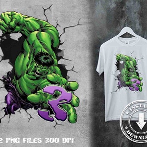 May include: Green Hulk character breaking through a cracked concrete wall with a purple number 2 in the foreground.  The image is on a white t-shirt.