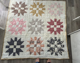 Large double patchwork quilt. Star pattern in Art Gallery fabrics. hand quilted