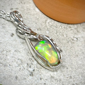 Sterling Silver Wire Wrapped Ethiopian Opal Pendant: October Birthstone