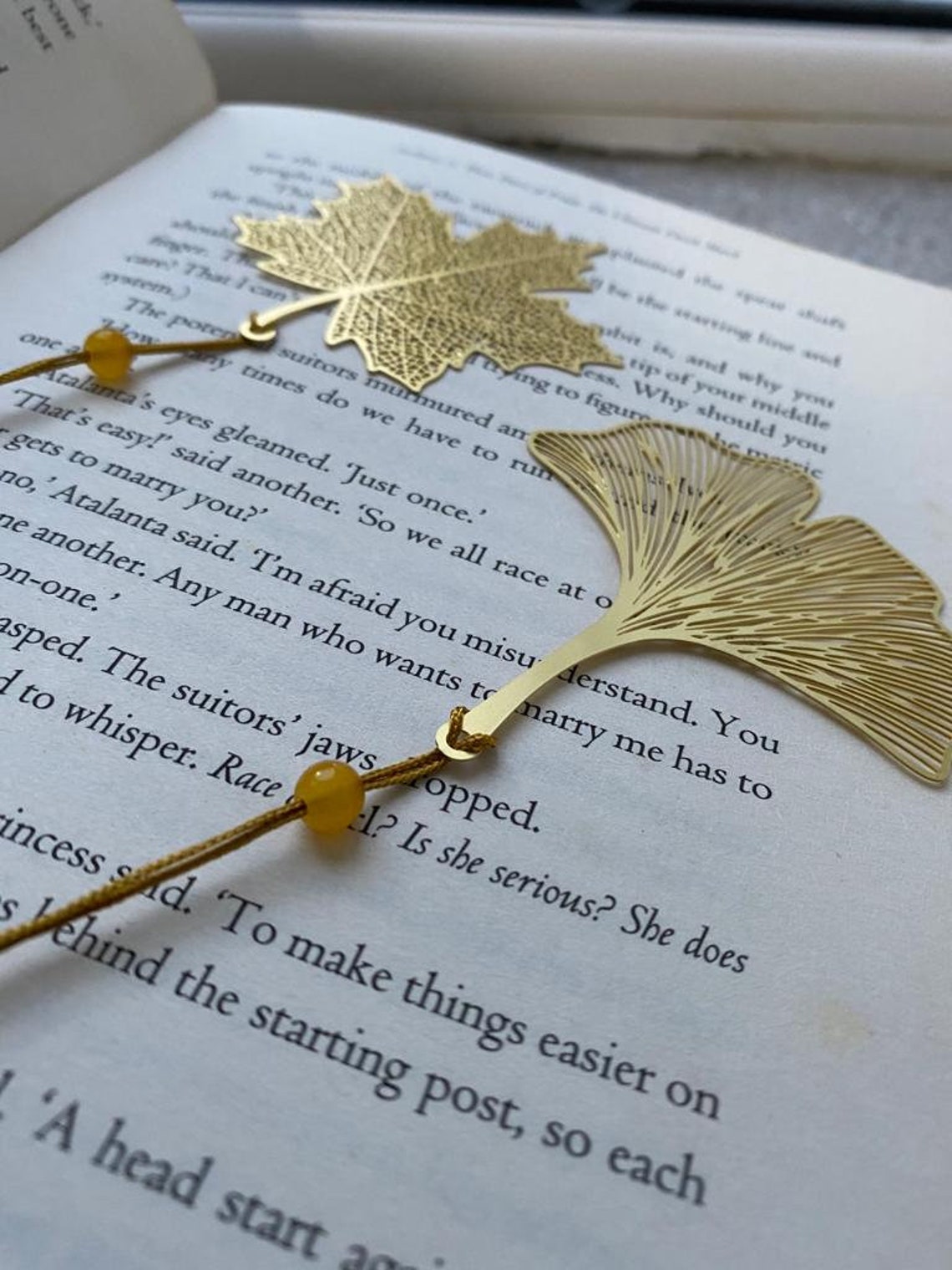 Goldplated bookmark available in eight intricate designs with Etsy
