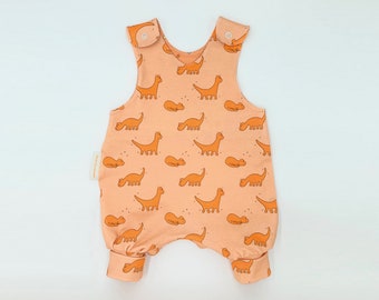 Mono de bebé con estampado de dinosaurios: algodón orgánico unisex