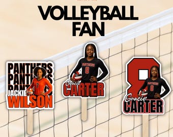 May include: Three custom volleyball fan signs featuring player photos. One sign shows Jackie Wilson in an orange jersey, while two signs feature Gracie Carter in a black jersey with the number 8. Each sign includes the player's name and team.