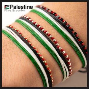 May include: Several Palestine flag bracelets are displayed, showcasing the colors of the Palestinian flag: black, white, green, and red. The bracelets feature various designs, including beaded and corded styles. The text "Palestine Flag Bracelet" is visible.