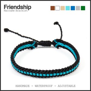 May include: Black macrame bracelet with a turquoise stripe. The bracelet is handmade, waterproof, and adjustable. The word "Friendship" is at the top of the image.