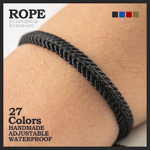 May include: A black rope friendship bracelet is shown on a wrist. The bracelet is handmade, adjustable, and waterproof. The image includes the text "ROPE friendship bracelet" and "27 Colors".
