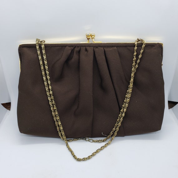 Vintage brown handbag with chain handle styled by… - image 1