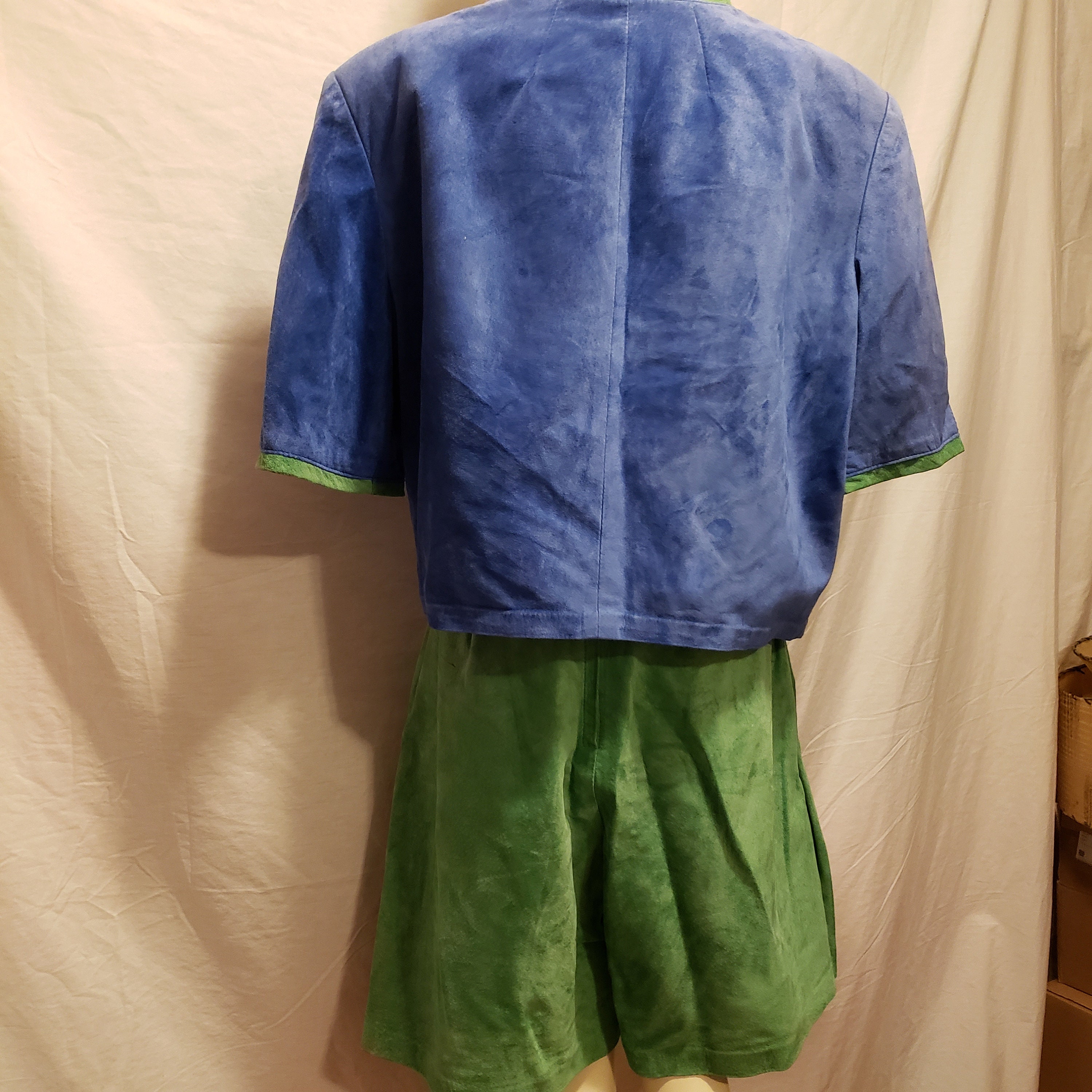 1980s green suede skirt and blue with green trim one button short sleeved blazer made by Daniel Leather