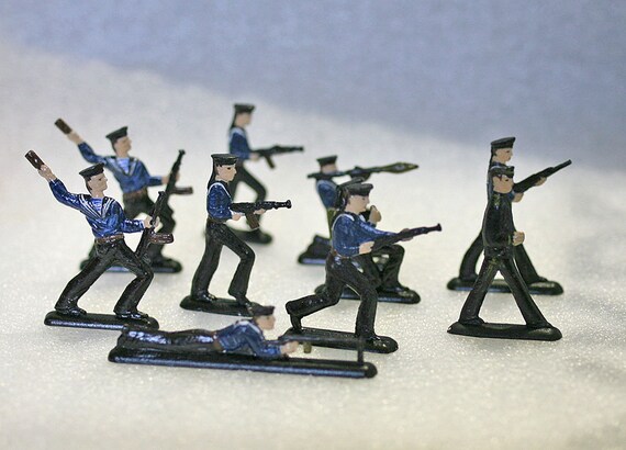 Vintage metal toy best sale soldiers