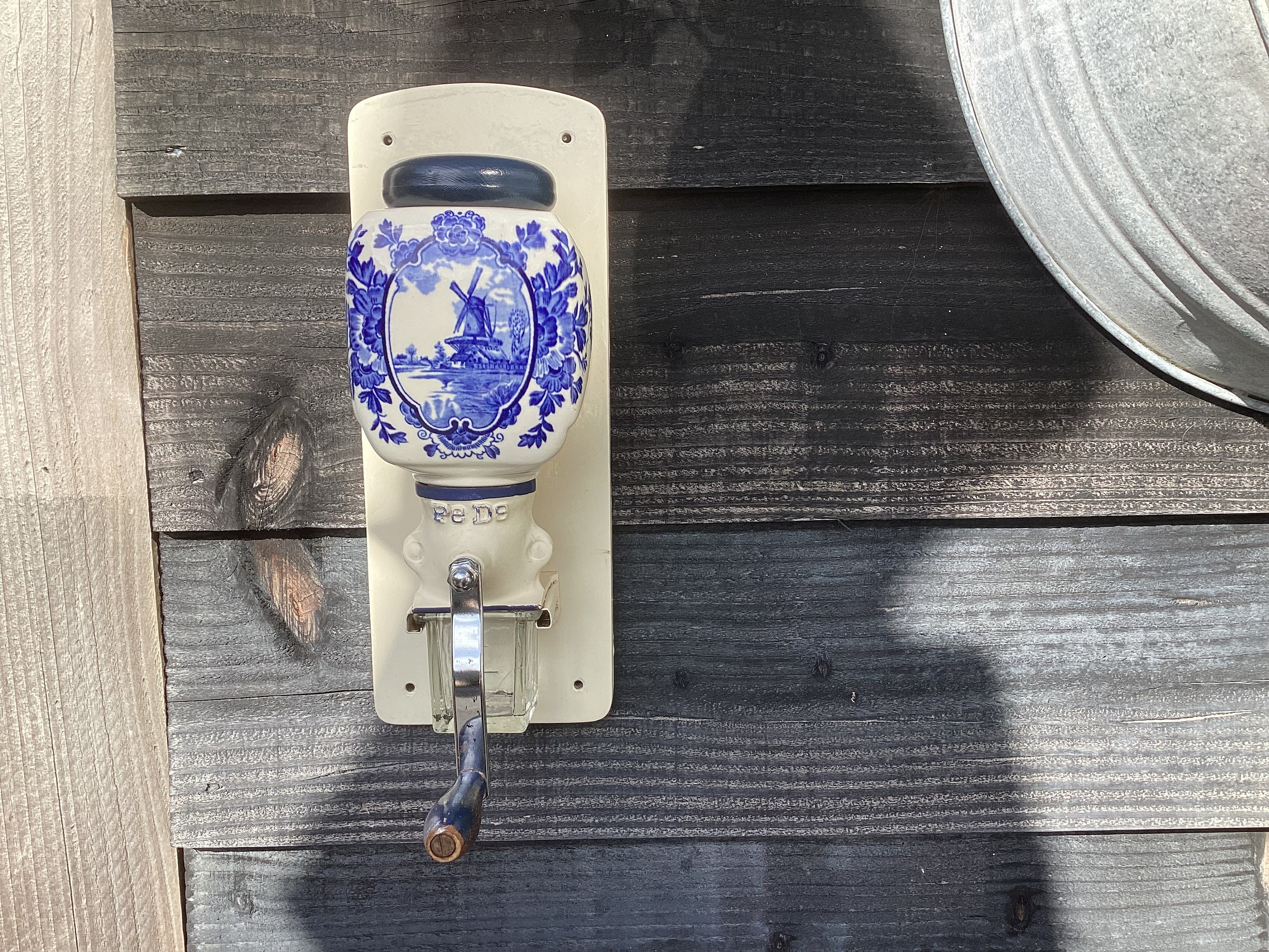 Old Pede Coffee Mill White/blue Ceramic, Cream-colored Wooden Wall