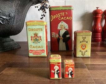 Droste Cocoa powder tins in various sizes - released by the well-known Dutch cocoa / chocolate brand Droste, in Haarlem