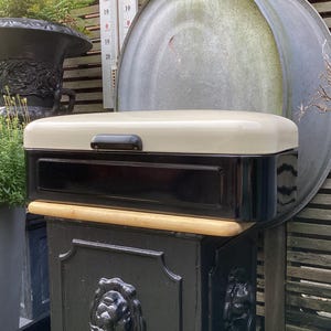 Enamel Bread Bin - black enamelled container with cream coloured enamel lid with bakelite handle - useful kitchen decoration Ca. 1950
