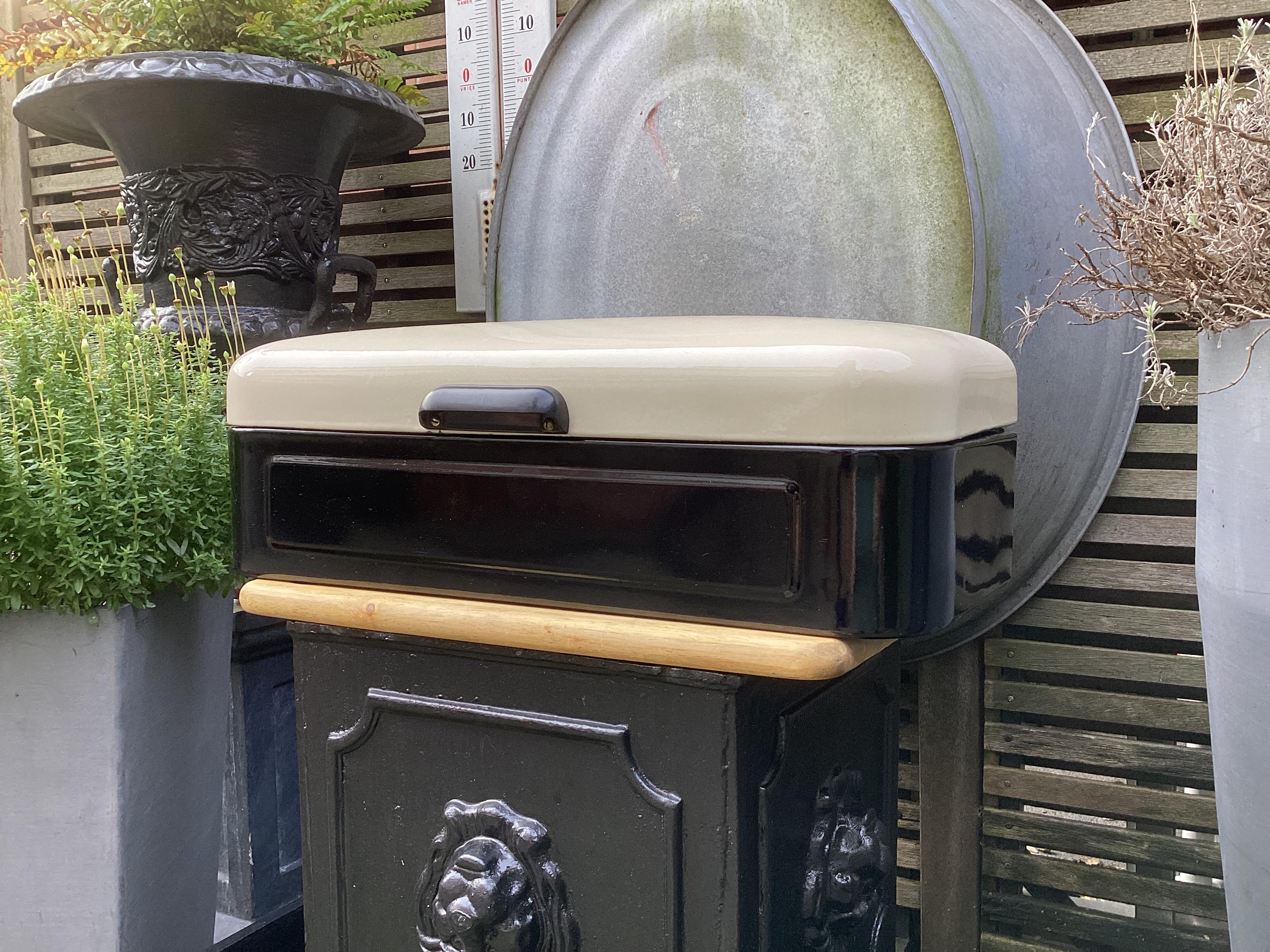 Enamel Bread Bin - black enamelled container with cream coloured enamel lid with bakelite handle - useful kitchen decoration Ca. 1950