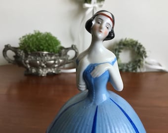 Halfdoll lidded box - Porcelain lady dressed in a blue ball dress - made around 1910/1920