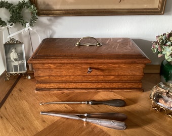 Old Wooden Chest for storing precious possessions such as jewelry, letters - elegant picture on the lid - original key