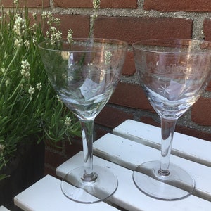 2 Large wine glasses, needle etched ornate motifs with cut stars and almonds France, ca 1910 Wedding gift Toast Bridal couple