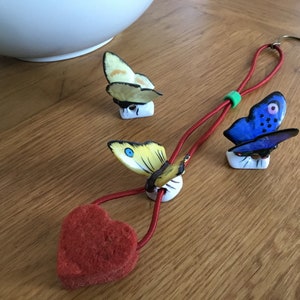 Special Butterfly Halfdoll - German porcelain butterfly with red felt heart as drop catcher - made between 1930 / 1950