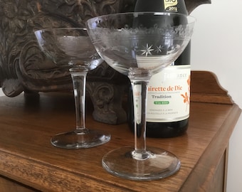 2 Champagne coupes, needle etched ornate motifs with cut stars and almonds France, ca 1910 Wedding gift Toast Bridal couple