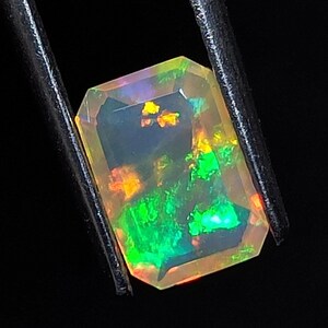 Faceted Ethiopian Opal Gemstone: Rectangle Cut, 1.00 CT (8.50 x 6 x 3.50 mm)