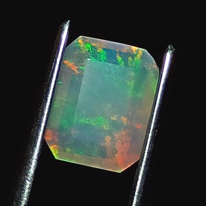 Natural Ethiopian Opal Rectangle Cut Faceted Gemstone Size:- 9 x 4 x 6.80 Mm. Rare Multi Fire Ethiopian Opal Best For Ring Jewelry. 1.30 CT