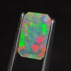 RECTANGLE---Cut Ethiopian Opal Faceted Gemstone Size:- 9.50 x 6 x 4 Mm. Rare Multi Fire Ethiopian Opal Best For Ring Jewelry. 1.20 CT