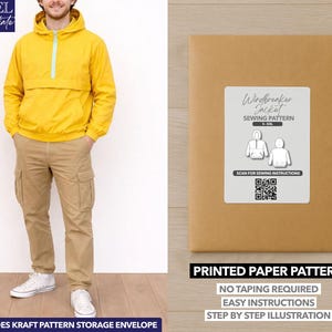 May include: A person wearing a yellow windbreaker jacket with a hood and a light blue zipper, paired with khaki cargo pants and white sneakers. A brown paper pattern envelope with a white label that says "Windbreaker Jacket Sewing Pattern" is also in the image.