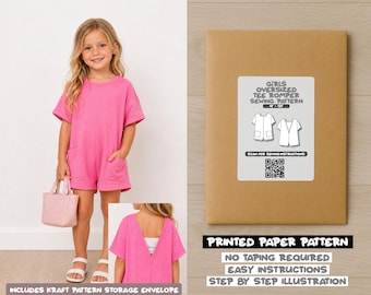 May include: A bright pink short-sleeved romper with front pockets and a deep V-back design, paired with a light pink handbag. Includes a brown kraft paper envelope with a label reading Girls Oversized Tee Romper Sewing Pattern and a QR code.