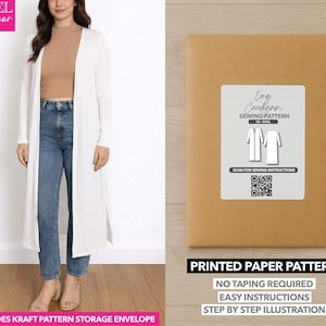 May include: A woman in a white long cardigan, brown top, and blue jeans. Beside her is a brown paper pattern envelope with a label saying "Long Cardigan Sewing Pattern". The text "Printed Paper Pattern" is also visible on the image.