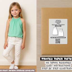 May include: A young girl wearing a mint green halter top and white pants. Next to her is a brown paper pattern envelope with a label that reads "GIRLS HALTER TOP SEWING PATTERN". The text "PRINTED PAPER PATTERN" is also visible.