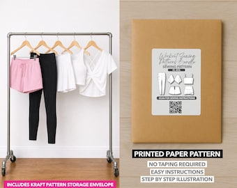 May include: A clothing rack displays workout apparel: pink shorts, black leggings, a white skirt, a white tank top, and a white criss-cross top. A brown paper pattern envelope with a label that reads "Workout Sewing Patterns Bundle" is also shown.