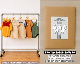 May include: A clothing rack displays five baby rompers in various colors and styles, including a yellow and red Winnie the Pooh-themed outfit. A brown paper pattern envelope is next to the rack, with text that reads "Baby Romper Sewing Pattern Bundle".