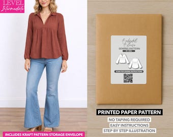 May include: A woman wearing a rust-colored blouse and light blue flared jeans. Next to her is a brown paper pattern envelope with a white label that reads "Epbybll Blouse Sewing Pattern." The envelope also states "Printed Paper Pattern" and "Includes Kraft Pattern Storage Envelope."