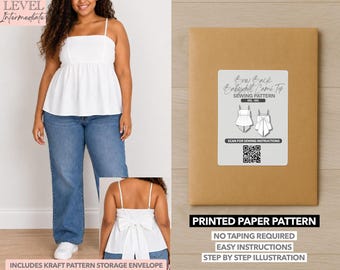 May include: A white babydoll cami top sewing pattern with a bow back design. The kit includes a kraft paper storage envelope and printed paper pattern. The label features the text Bow Back Babydoll Cami Top, a QR code, and illustrations of the garment.