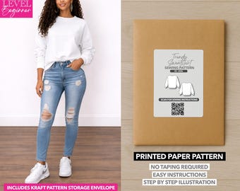 May include: A woman wearing a white sweatshirt and blue jeans. A brown paper pattern envelope with a white label that reads "Trendy Sweatshirt Sewing Pattern". The envelope also says "Printed Paper Pattern" and "No Taping Required".