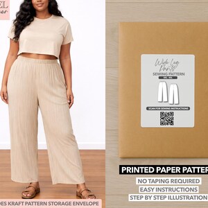 May include: A woman wearing a beige crop top and wide-leg pants. A kraft paper envelope with a white label that reads "Wide Leg Pants Sewing Pattern" is on the right. The text "Printed Paper Pattern" is below the label.
