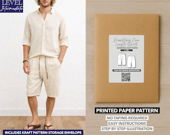 May include: A tan paper pattern envelope with a white label that reads "Drawstring Free Length Shorts Sewing Pattern". The image also shows a person wearing a linen shirt and shorts. The text "Printed Paper Pattern" is also visible.