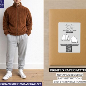 May include: A brown fleece jacket with a zipper, paired with gray sweatpants and white sneakers. Next to it is a brown paper pattern envelope with a white label that says "Bomber Jacket Sewing Pattern". The text "Printed Paper Pattern" is also visible.