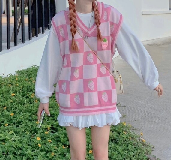 pink sweater vest