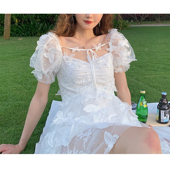 white butterfly dress