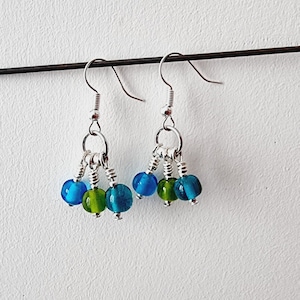 boucles d'oreilles pendantes en verre de Murano. image 1