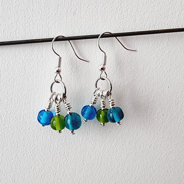 boucles d'oreilles pendantes en verre de Murano.