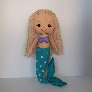 Hand sewn felt mermaid doll & free stand.